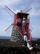 Windmill in São João with folklore group